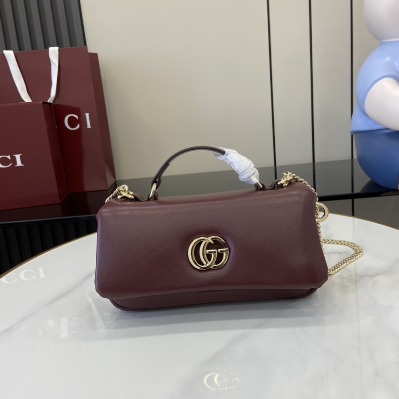 G*u*i top handle bags